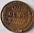 1957-D WHEAT CENT, STRUCK THRU RETAINED FRAGMENTS ERROR, AU/MS, RD/BN CIRCULATED