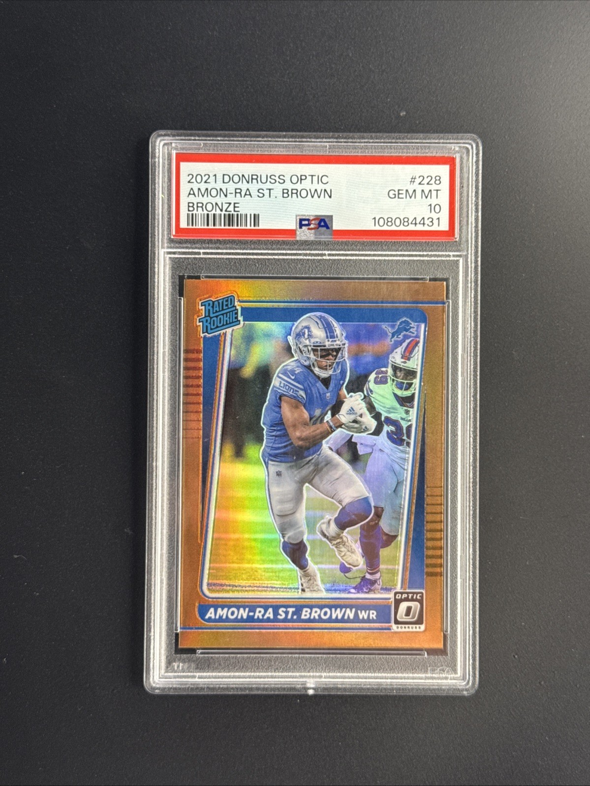 Amon-Ra St. Brown Panini Donruss Optic #228 Bronze