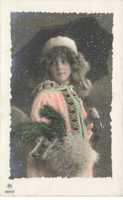 Child - Grete Reinwald with a sleeve and protecting herself from the snow under a