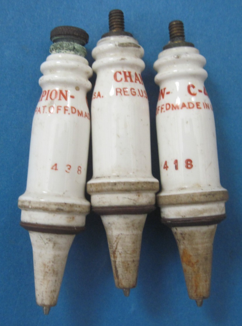 3 New Old stock Champion C-4 Spark plug cores for Model A Spark Plug