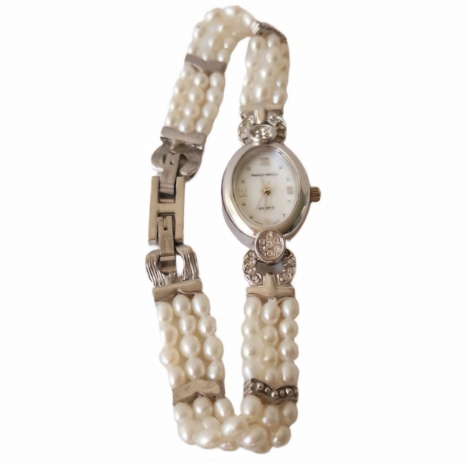 Raro reloj para mujer Paolo Gucci 1964 vintage plateado, cuarzo y perla real Foto 2 de 4