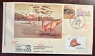 Australia #1348-49 Dinosaurs first day cover with Uganda souvenir sheet