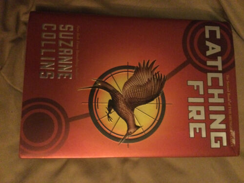 Catching Fire (Hunger Games Trilogy) - Suzanne Collins: 9781407153346 -  AbeBooks