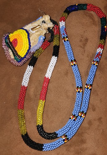 Native medicine bag hand beaded, 18 inch long. Vintage.
