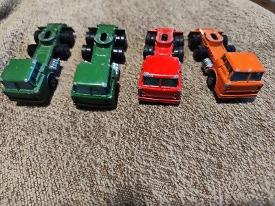 Vintage Yatming 1970 Ford C600 Semi Hauler lot of four. Green red and orange 