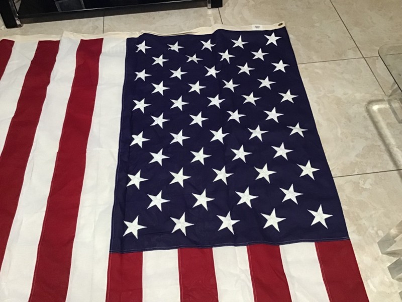 Interment USA flag in heavy cotton. 57 inches (4.9 ft ).by 106 inches (8.10 ft.)