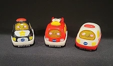 V-Tech Go! Go! Smart Wheels Rescue Police Car, Fire Truck. Ambulance Set of 3