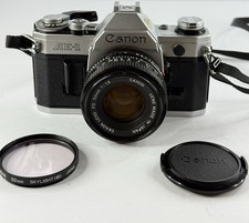 Canon AE-1 Silver 35mm SLR Film Camera  FD 50mm f/1.8 Lens Tested See Video