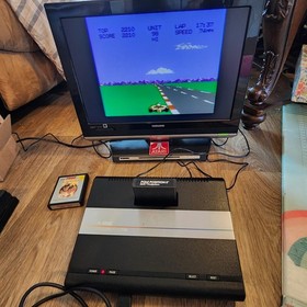 Clean Atari 7800 Console w/2 Proline Controllers, 3 games, RF Cord, & New Plug.