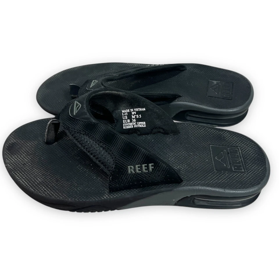 Sandalias Reef para mujer 7 para hombre 5 negras abanico abrebotellas playa costera Foto 2 de 4