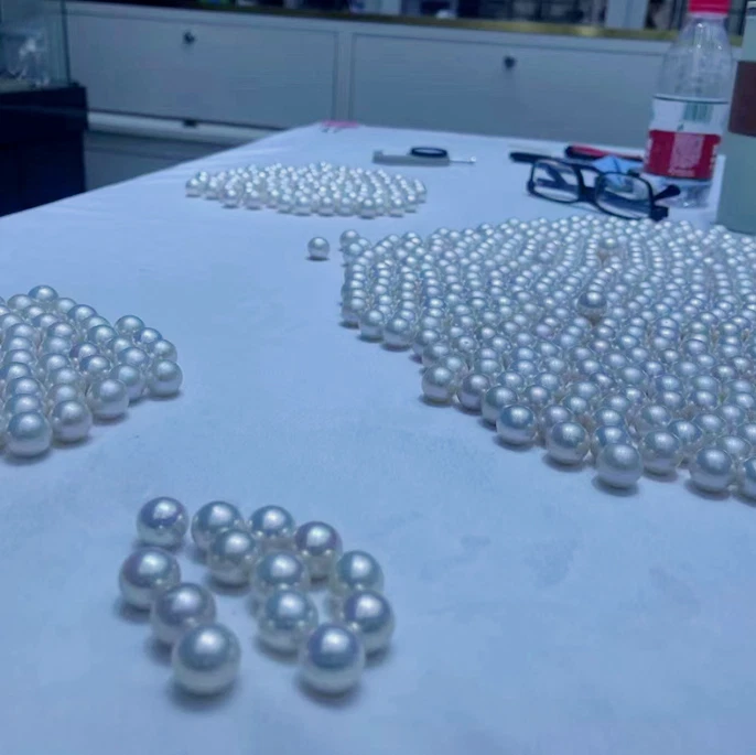 Precioso ENORME AAA 10-11mm Mar del Sur Redondo Blanco Perla Suelta Sin Perla Foto 2 de 2