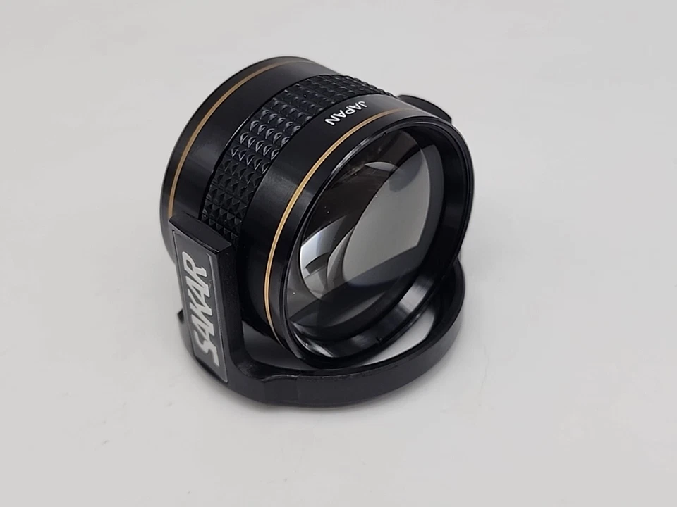 LENTE DE CÁMARA 35 MM AF 0,55 X 1,5 X SAKAR con accesorio de montaje giratorio Foto 4 de 4