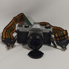 Pentax Asahi K1000 fotocamera reflex pellicola 35 mm con obiettivo messa a fuoco manuale attacco PK 50 mm TESTATA