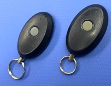 PAIR OF AUDIOVOX KEYLESS REMOTE START FOB CLICKER TRANSMITTER ELVATCC AVX-1B4S