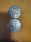 Two 1997 - 1 oz Silver American Eagles  (Near Uncirculated).