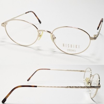 SEIKO Titanium Eyeglass Frames Nishiki T819 49-19  140 Gold Tone NWOT Demo Lens