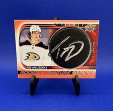 2022-23 Upper Deck Trilogy Rookie Signature Pucks #21 SP-TZ Trevor Zegras Auto
