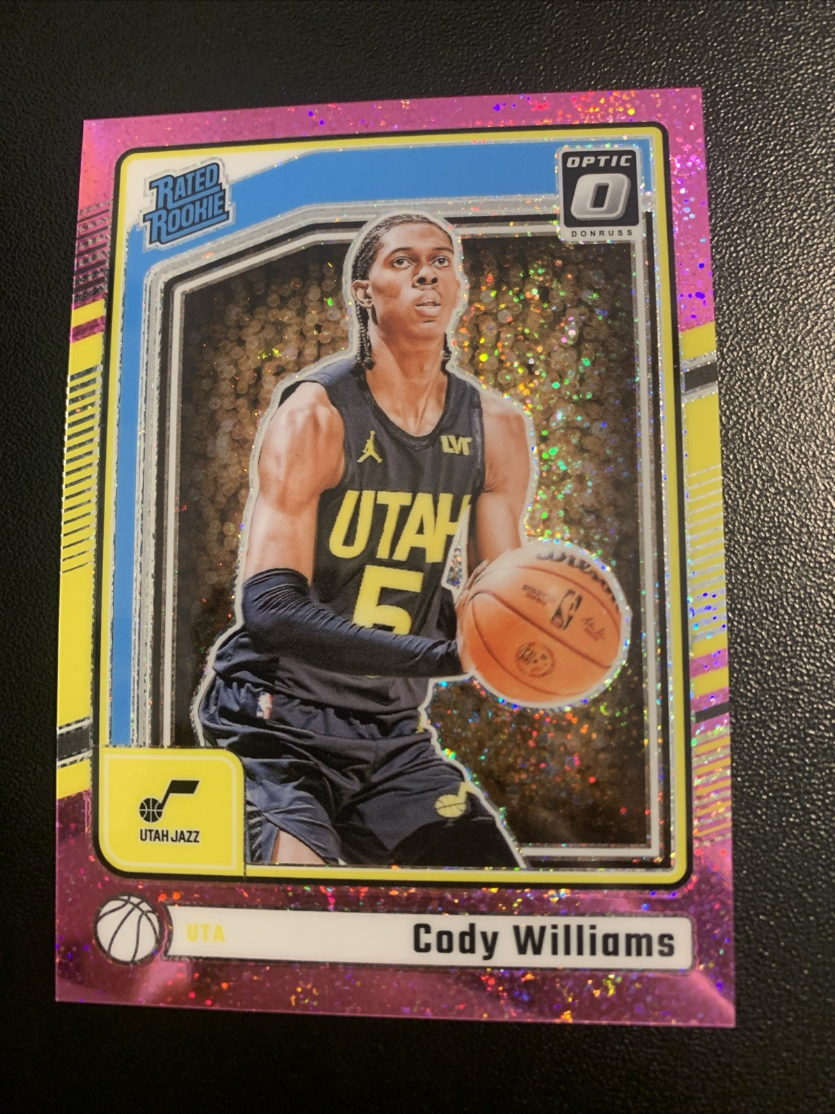 2024-25 Cody Williams Panini Donruss Optic Pink Glitter /275 Rated Rookie #298