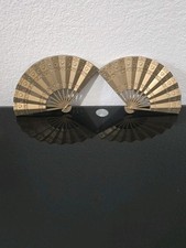 These decorative fans are unique and eye-catching, perfect for adding elegance.