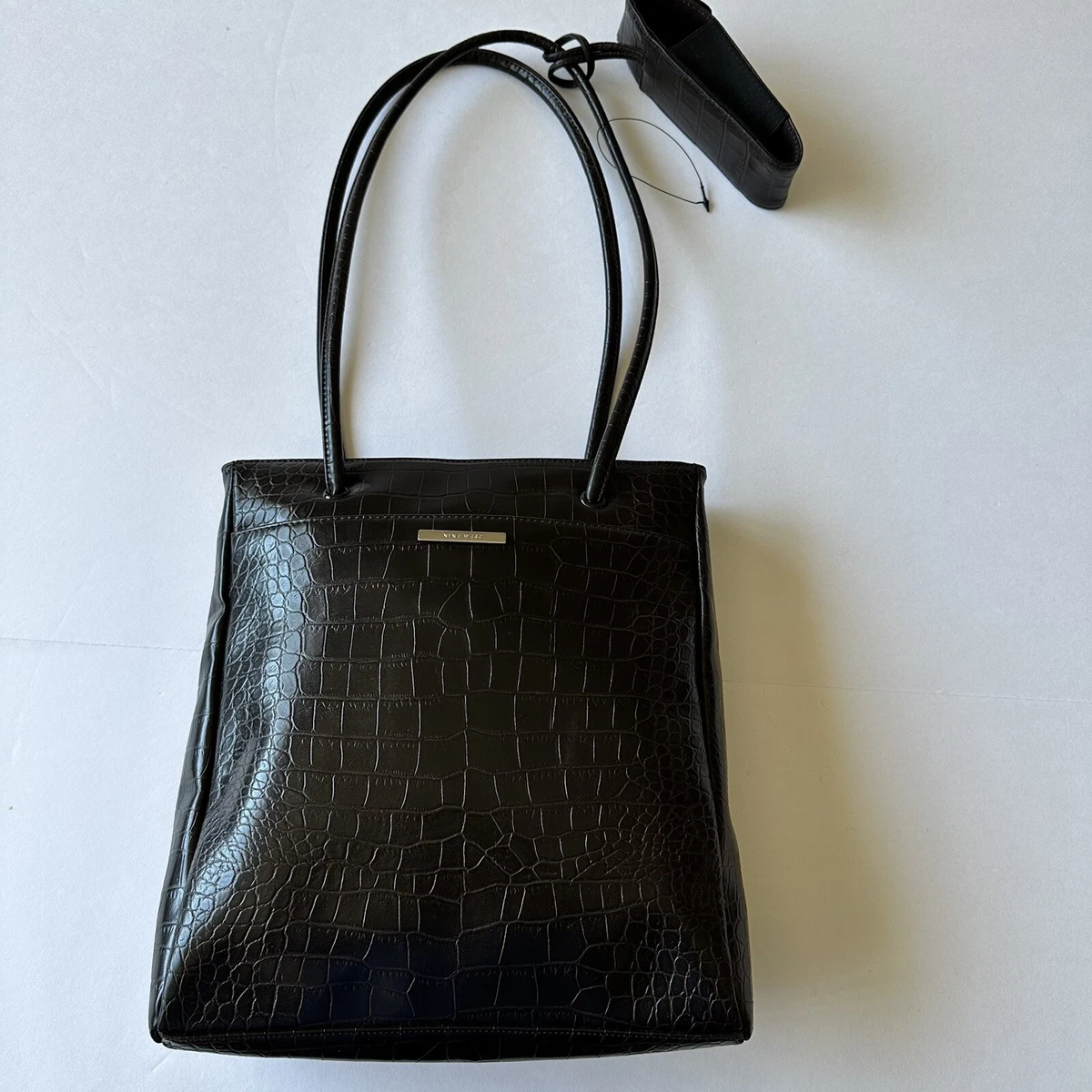 Handbags with online cell phone pocket