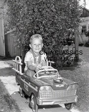1960 FIREMAN FIRE ENGINE VINTAGE PEDAL CAR PHOTO CUTE BOY KID ALL SMILES PLAYING