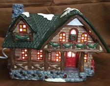 Santa’s Best Christmas in Vermont lighted Ski Lodge