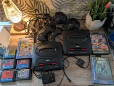 Sega mega Drive Consoles X2 And 4 Controllers And Assorted Games As Pictured