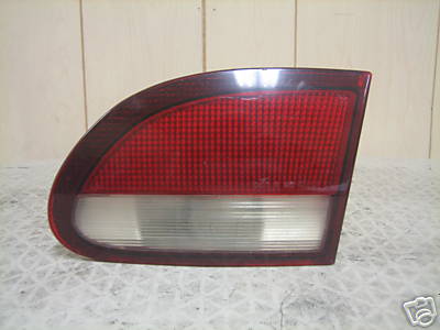 1995-96-97-98-1999 CHEVROLET CAVALIER TAIL LIGHT ASSEMBLY INNER PASSENGER SIDE/ - Picture 1 of 5