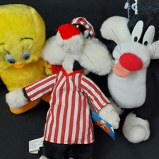 2 Vintage Selvester's and a Tweety Plush. By Looney Tunes, Applause, and24K