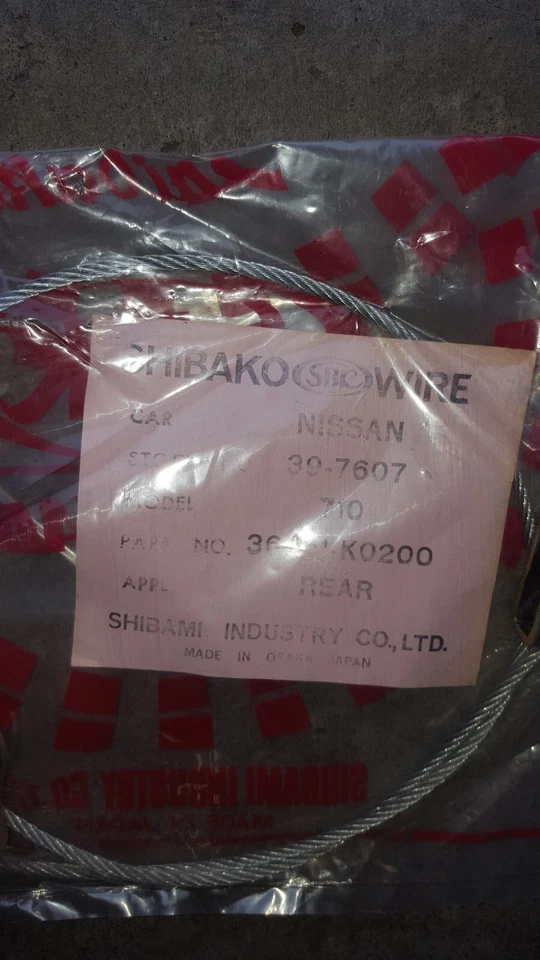 Cable de freno de estacionamiento trasero Datsun freno eléctrico se adapta a 75-77 Nissan 710 140j, 160j nuevo en caja Foto 2 de 2