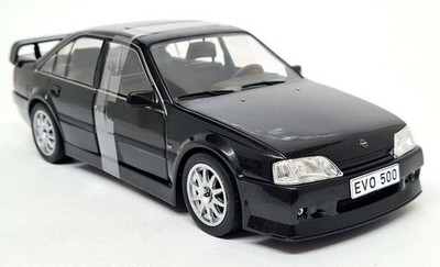 Whitebox 1/24 - Opel Omega Evolution 500 schwarz metallic Diecast Scale Modellauto