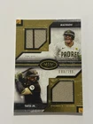 Manny Machado & Fernando Tatis Jr. 2025 Topps Tier One Dual Player Relic /199