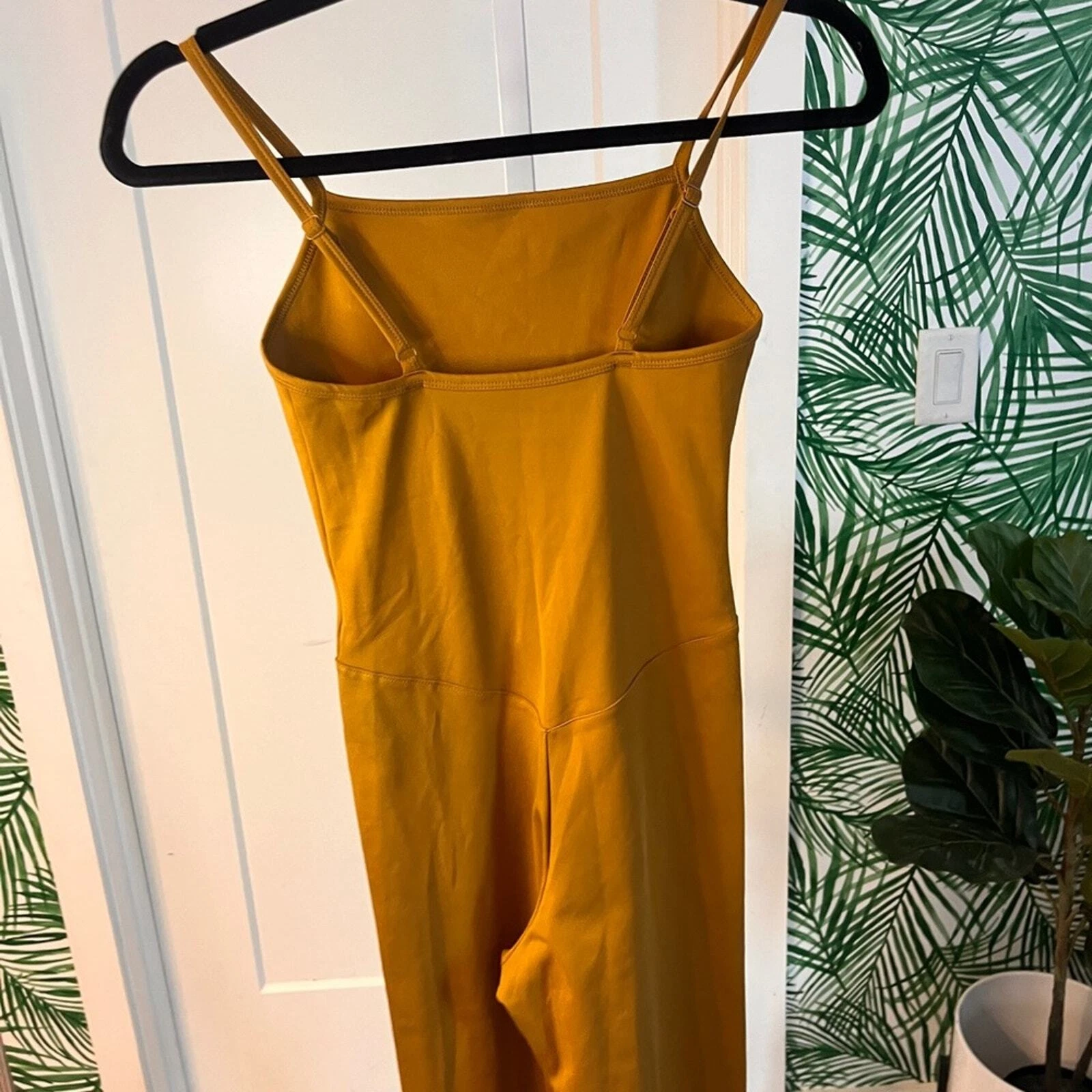 girlfriend-collective mustard one piece unitard 