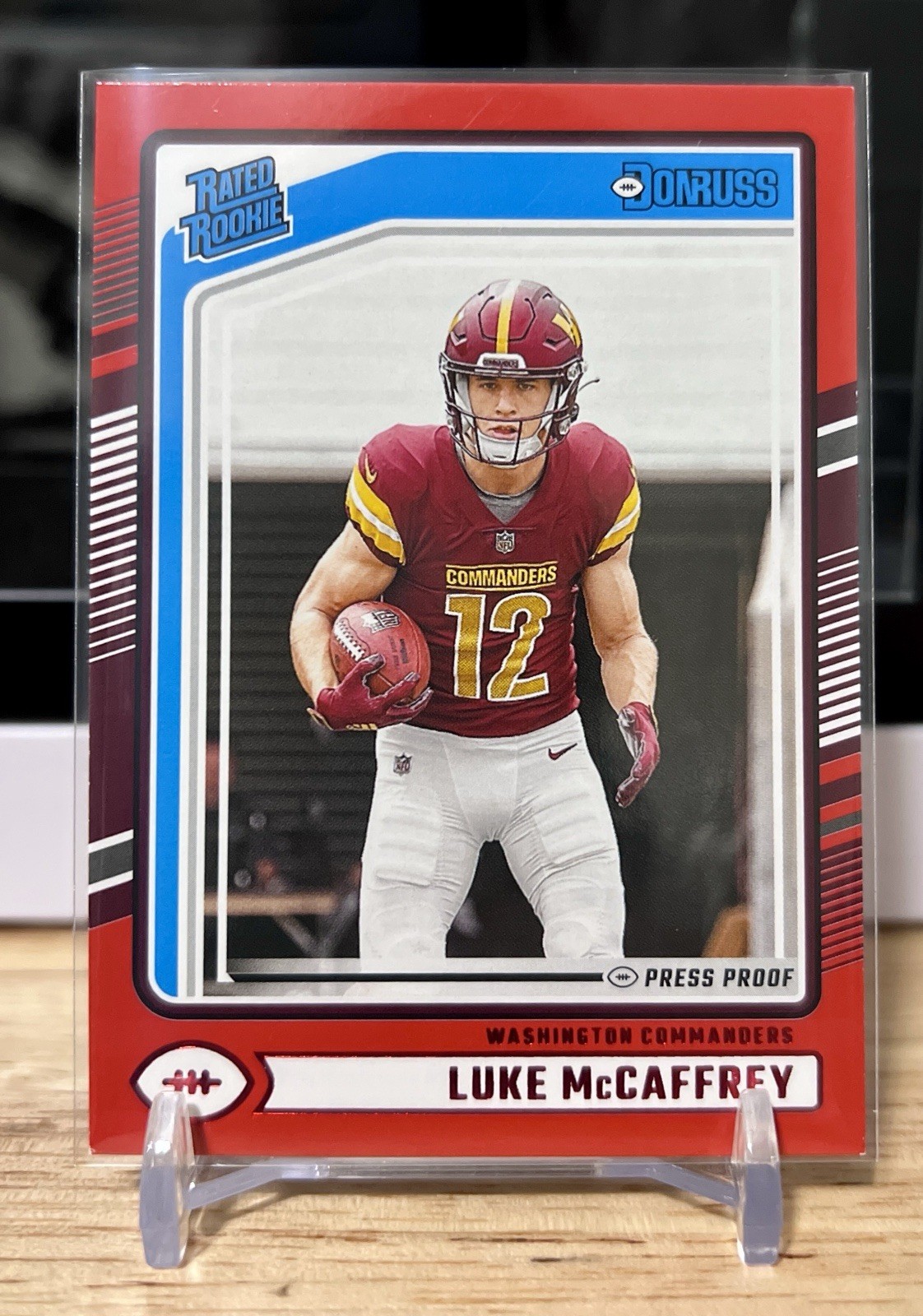 2024 Panini Donruss - Rated Rookie Luke McCaffrey #302 Press Proof Red (RC)