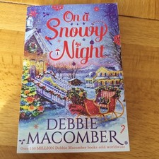 On A Snowy Night: The Christmas Basket / The Snow Bride by Debbie Macomber...