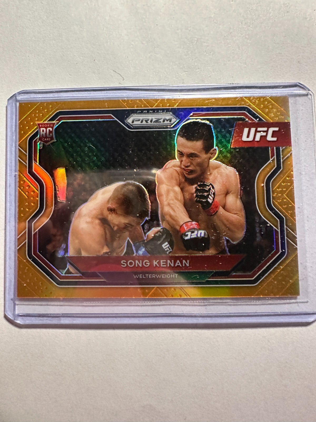 K34,774 - 2021 Panini Prizm UFC Prizms Orange #167 Song Kenan #/99