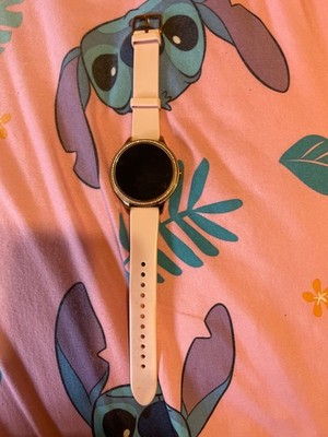 fossil smart watch women pink with gold rhinestones and a silicone pink band