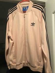 pink adidas jacket with black stripes