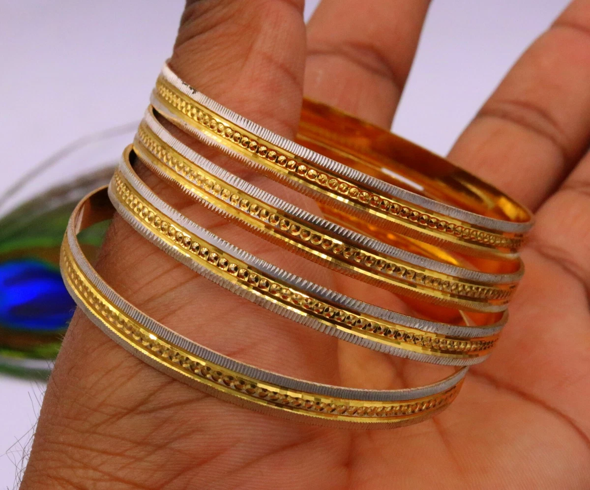 New bangles designs  New gold jewellery designs, Gold bangle set