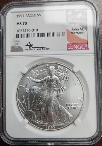 1997 Silver Eagle Grade by NGC MS70 Signed by John M. Mercanti - Few Spots