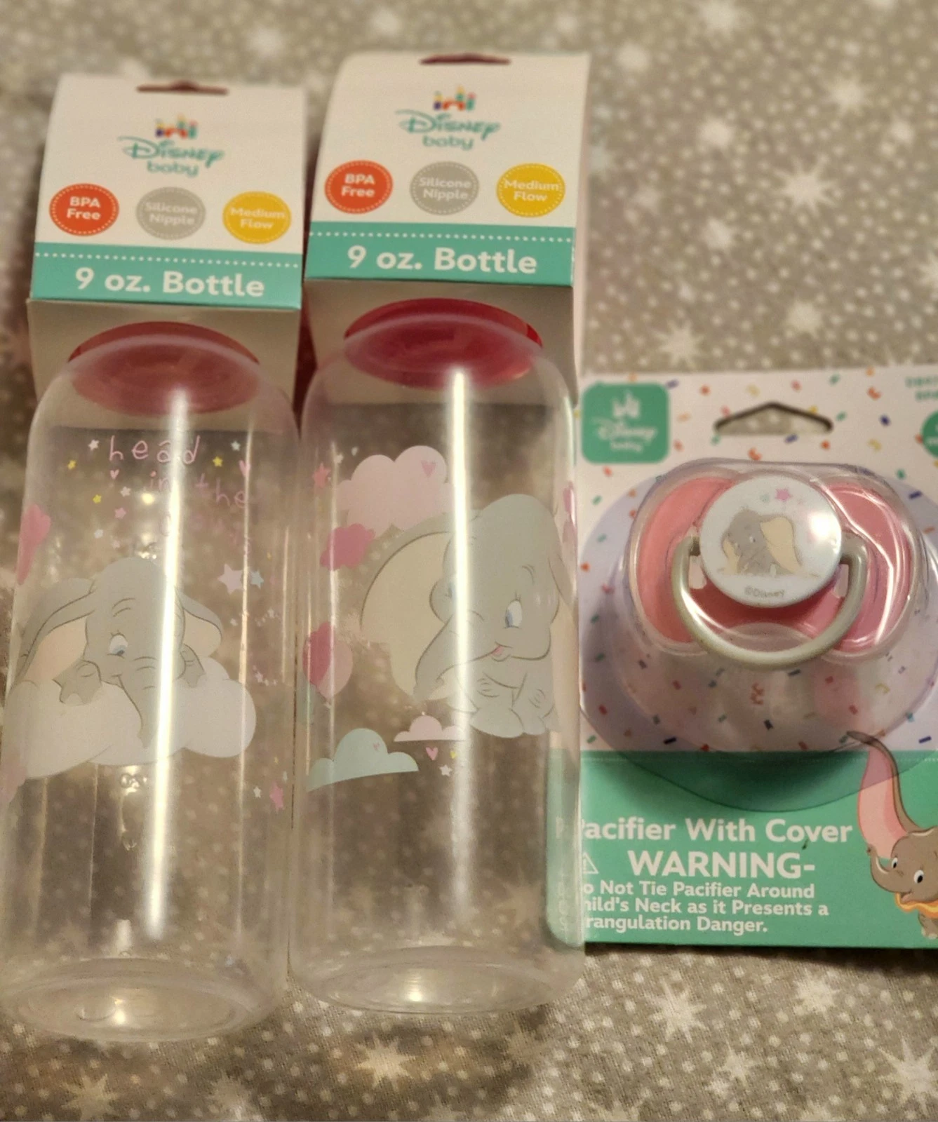 Disney Baby Dumbo Combo 2x 9oz Bottles and Pacifier With Cover Pink Set.
Opens in a new window or ta