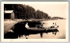 Vtg B&W Snapshot Family In Rowboat Lake Cabins 1940s
