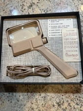 Donegan Optical Co, 2"x4" glass Masterpiece Illuminating Magnifier, works
