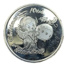 2001 Christmas Wish Angel. 999 SILVER 1 Troy Oz Round 39.95 per troy oz
