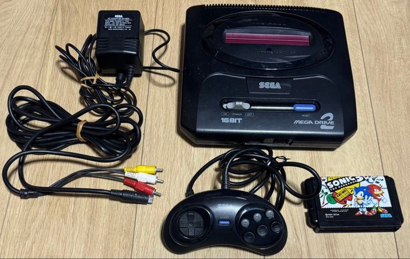 SEGA Mega Drive 2 console with Sonic the Hedgehog 3 and controller
