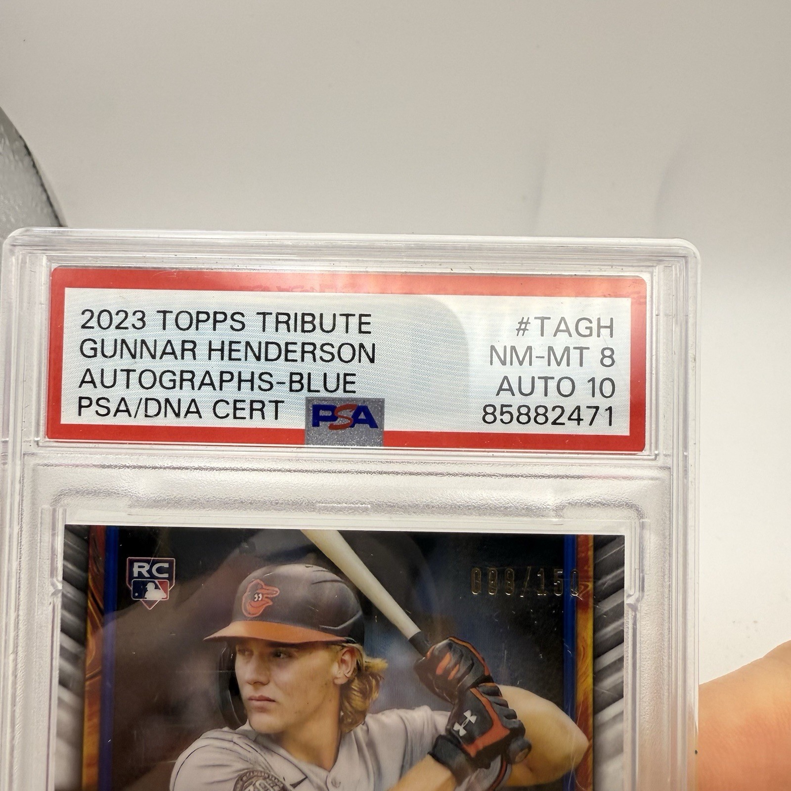 2023 Topps Tribute Gunnar Henderson Blue Auto /150 RC PSA 8 Auto 10 Orioles view 2