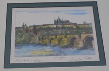 1999 HAND COLORED ART PRINT OF PRAGUE, ARTIST SIGNED, FRAMED & MATTED, BRIDGE