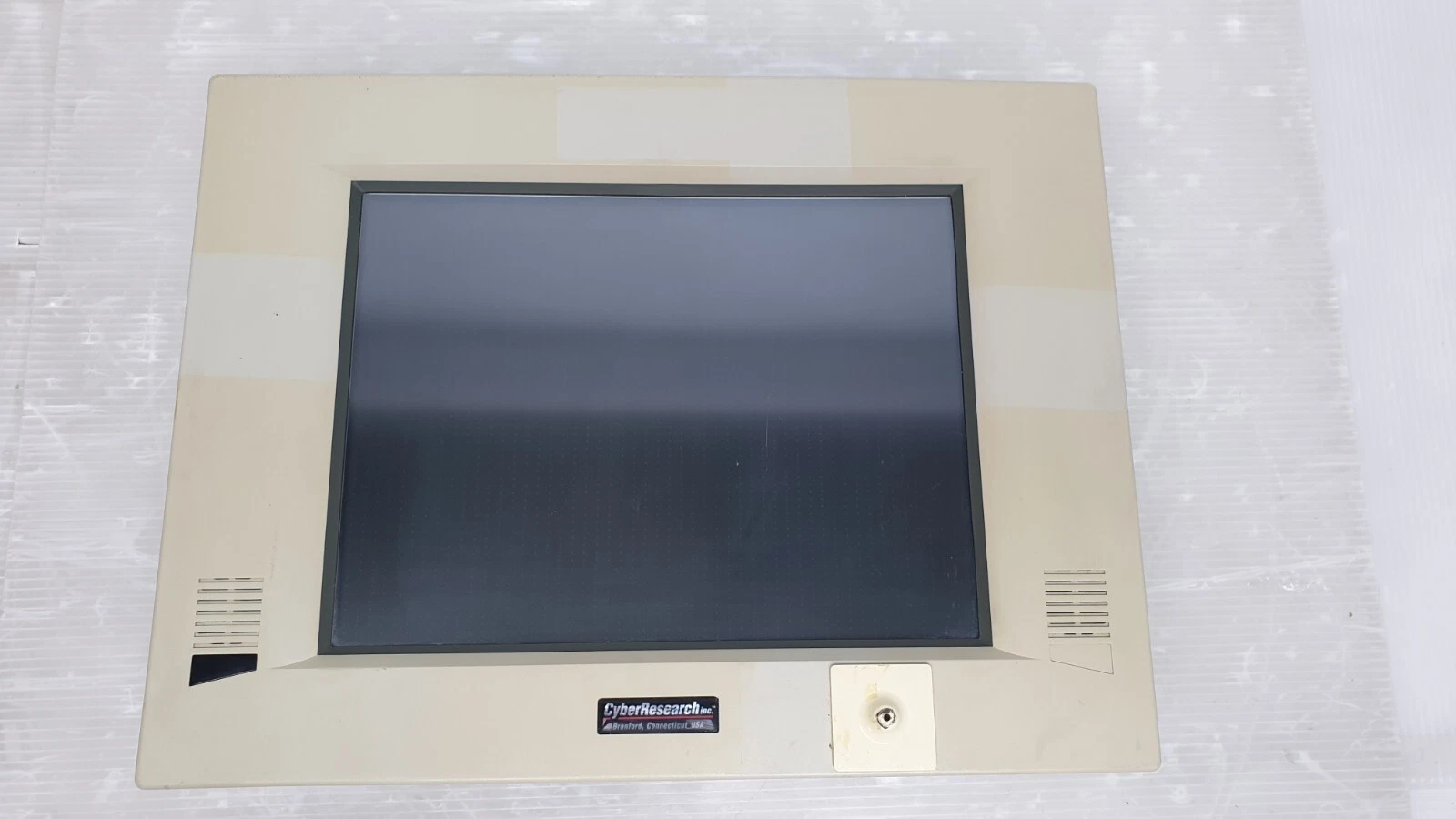 Front bezel of the STC 12-T pump controller computer, straight-on view
