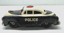 Vintage Friction Tin Toy Police Car from Unknown Maker Maybe S.S.S. Toys 