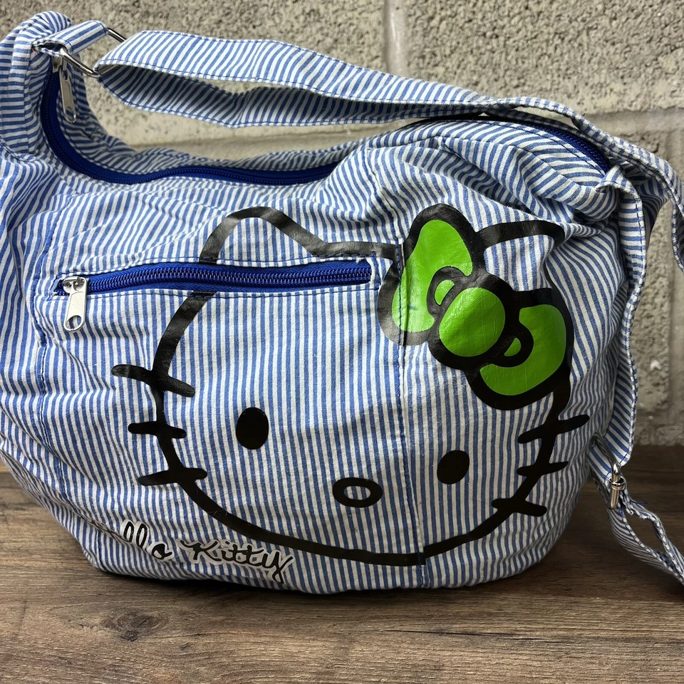 Bolso de mano Hello Kitty Sanrio 2012 azul verde mini lazo estampado integral Foto 4 de 4